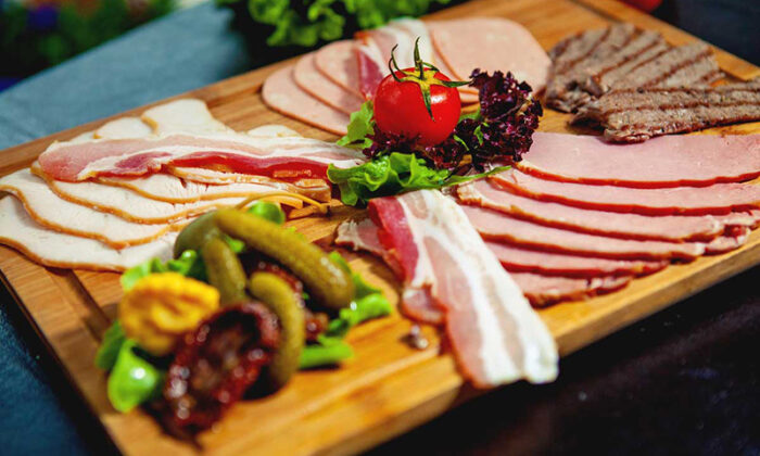 close up of meat platter with ham, salami, beef slices, sausage,